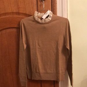 Light brown sweater with crotchet detailing